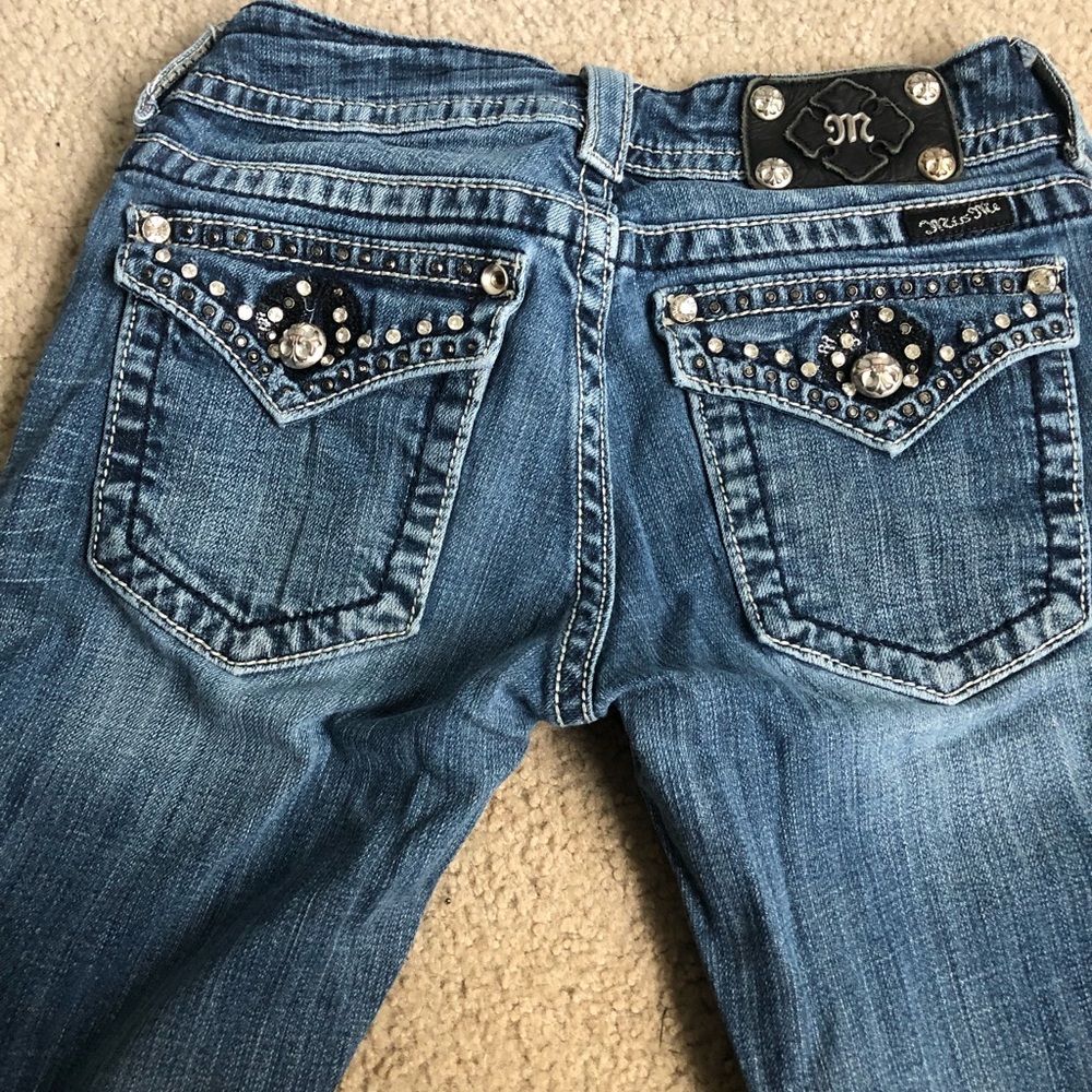 27x35 dark wash and distressed Miss Me jeans